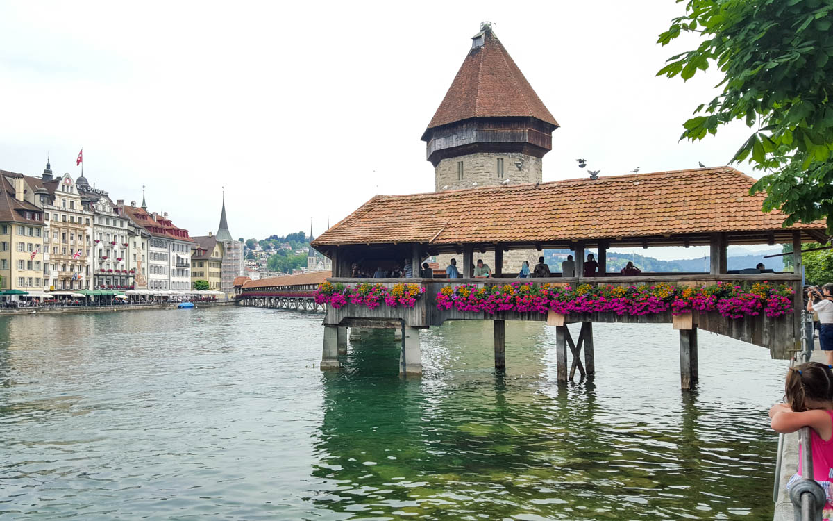 tower bridge over Reuss river in Lucerne city