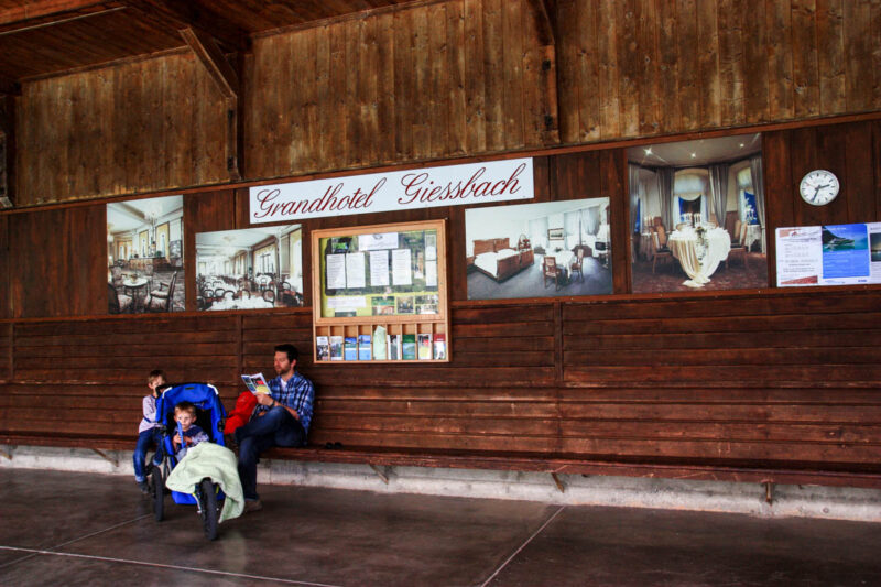 family waiting at entrance to Giessbach funicular