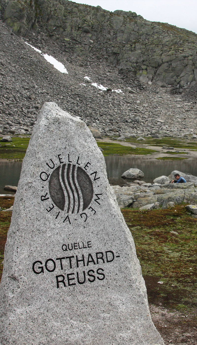 This beautiful hike at the Gotthard Pass circles a big reservoir before heading up the rocky mountain to the source of the Rhein river, a bubbling spring nestled in the rocky peaks. Part of the Vier-Quellen-Weg, Switzerland. www.momstotszurich.com
