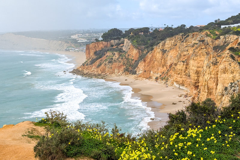 view from cliffs to Praia Canavial beach near Lagos